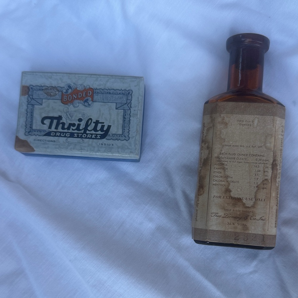 Vintage pharmacy lot with cardboard prescription box and calmitol glass bottle